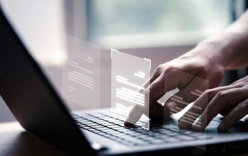 hand-using-laptop-computer-with-virtual-screen-document-online-approve-paperless-quality-assurance-erp-management-concept_616485-61